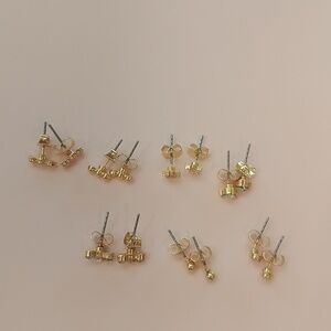 7 pairs of gold post earrings